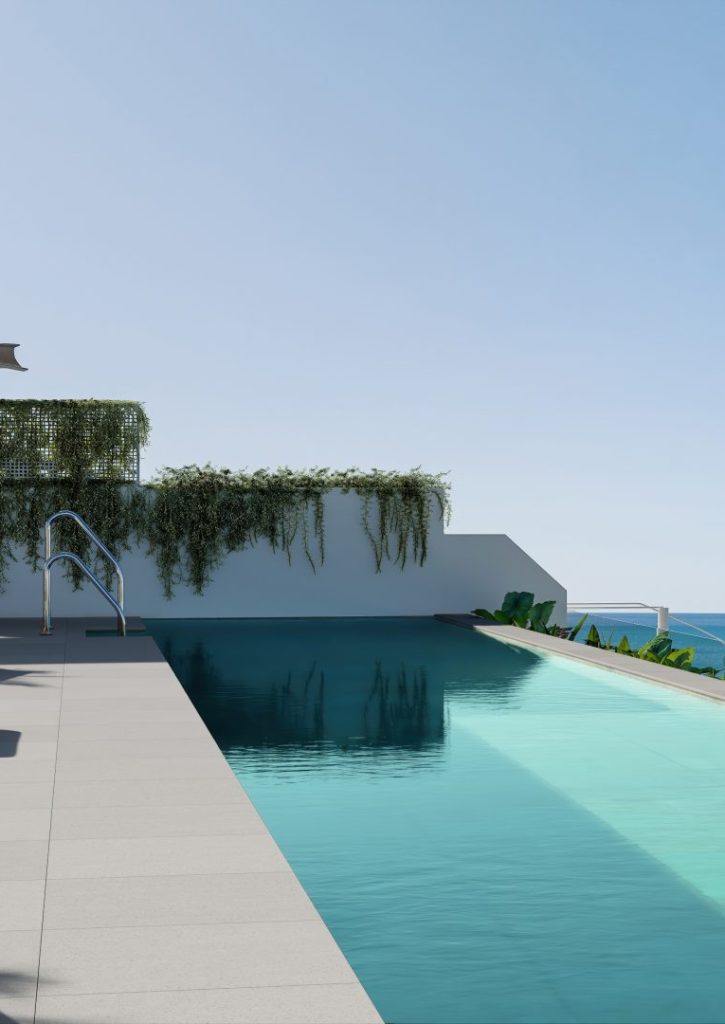 Terraza y piscina común de la promoción de Almara en Rincón de la Victoria.